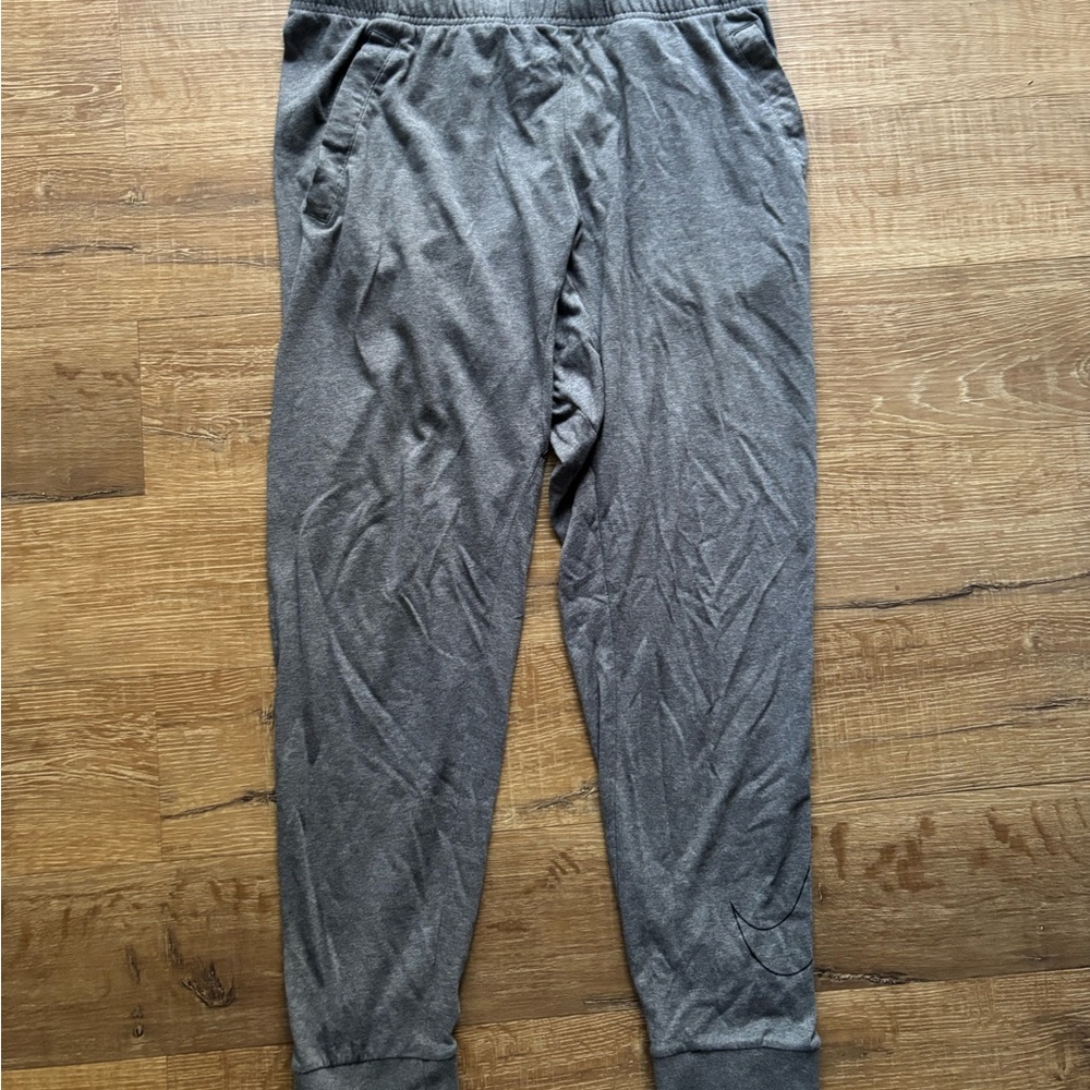 Nike Gray Sweatpants with Elastic Waistband and Tapered Legs